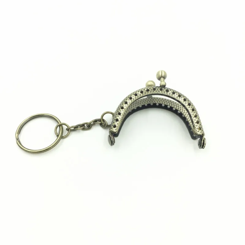 

10Pcs Vintage Bronze Tone Purse Bag Clutch Metal Arch Frame Kiss Clasps Clips Lock Handle Key Ring 5x4cm