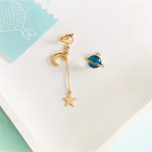 O envio gratuito de moda senhoras jóias personalidade colorida lua série planeta assimetria longo meninas brincos acessórios