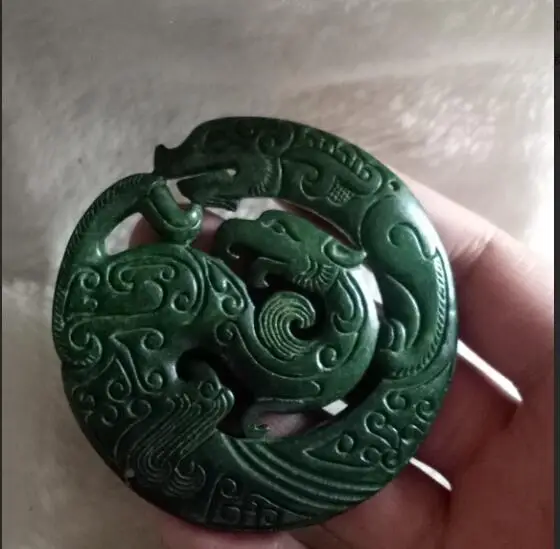 

Free delivery of old handmade sculptures of jade Double Dragons