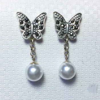 

S925 sterling silver inlaid imitation pearl pearl butterfly exquisite retro fashion ear hanging Earrings
