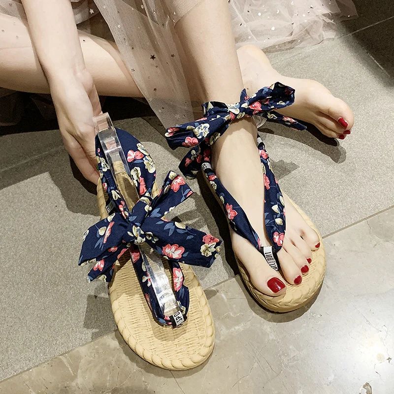 

New woven bottom sandals female 2019 summer fashion wild flat bottom strap wild bow tie toe flip flops fashion shoes wear