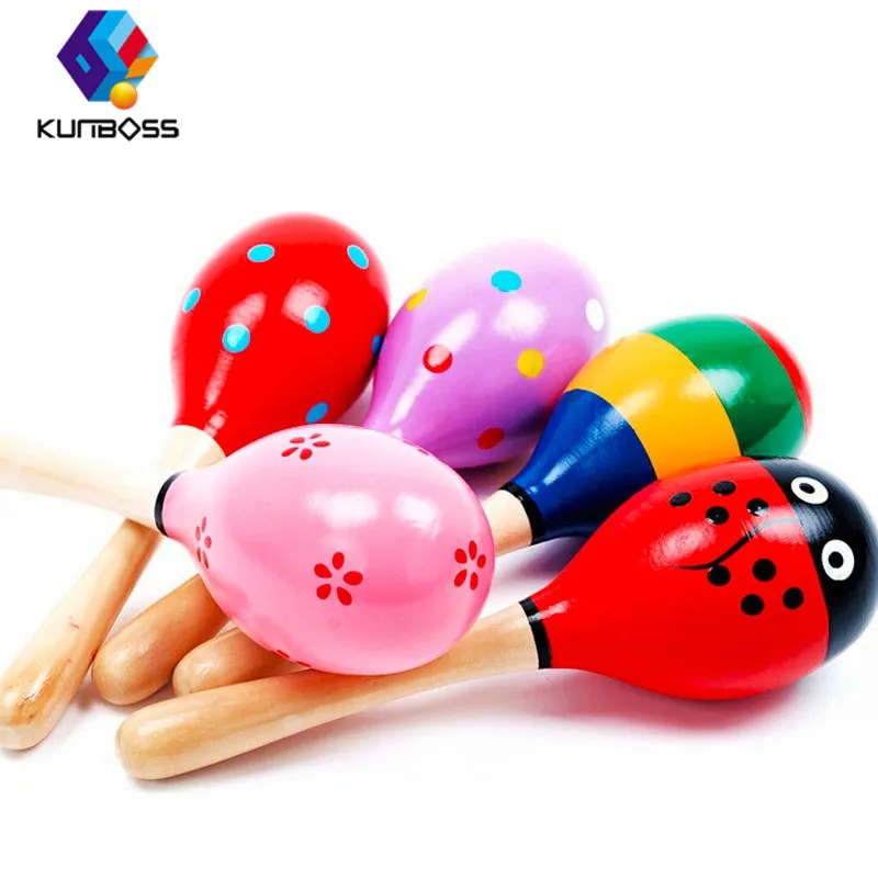 детские музыкальные инструменты колокольчики маракасы. музыкальные инструменты игрушки маракасы. маракас деревянный. погремушка музыкальный инструмент для детей. детские музыкальные погремушки.