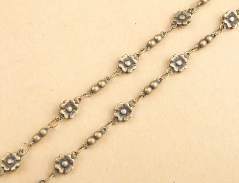 

1 Meter of Antiqued Bronze flower handmade chain #91338