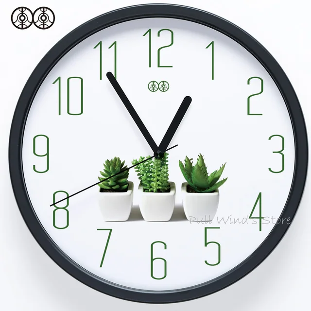 Brief small fresh home wall clock Green plant logo creative office wall