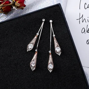 

12pairs/lot Korean version fashionable long earrings with hollow leaves tasseled leaves zircon earrings cross border Earrings