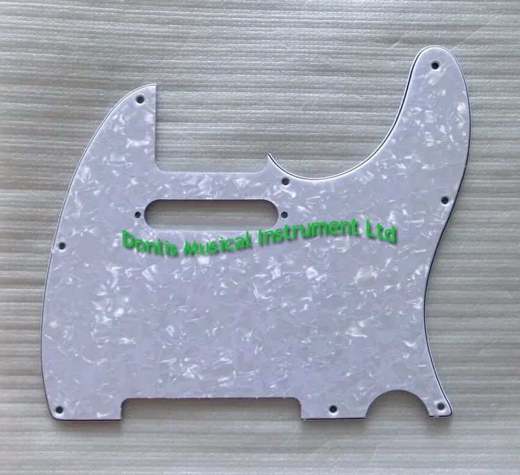 white pearloid guitar pickguard