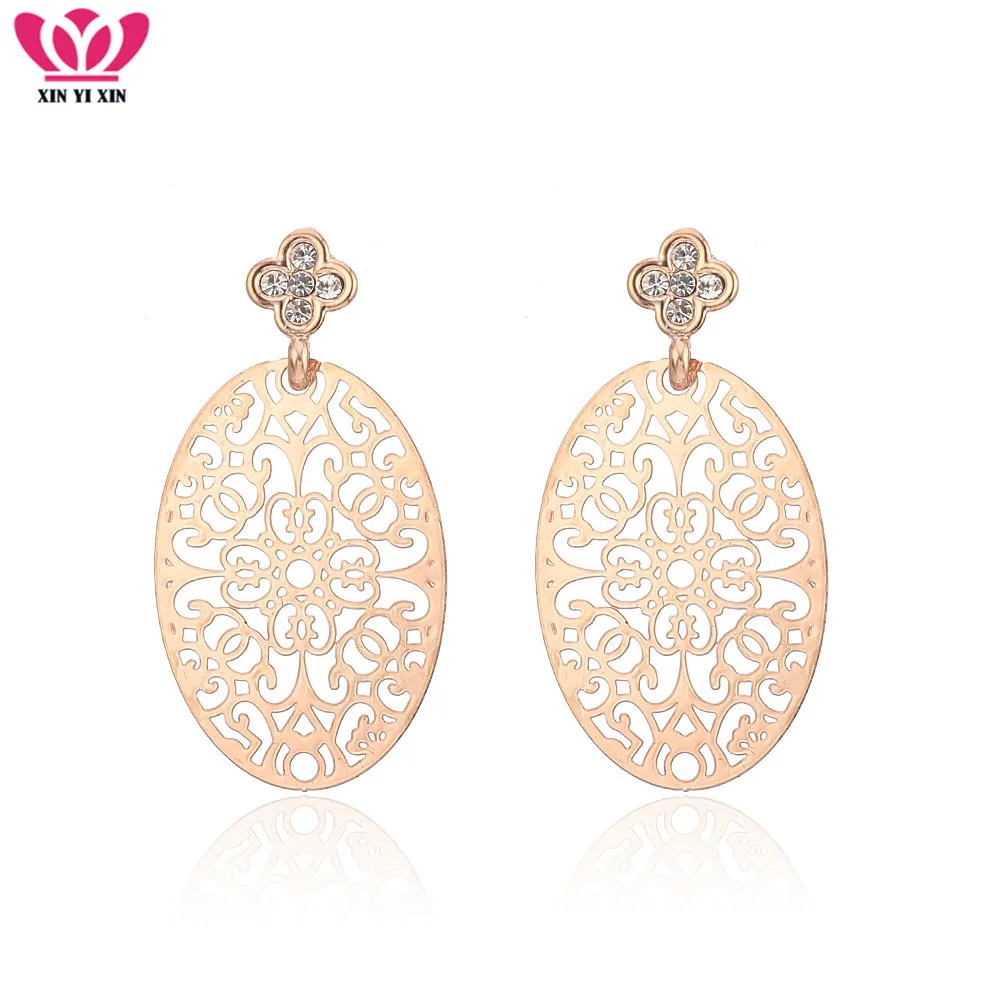 

Wholesale Rose Gold Color Hollow Oval Shape Drop Earrings Clover Crystal Dangle Earrings For Women Jewelry Fashion Accessories
