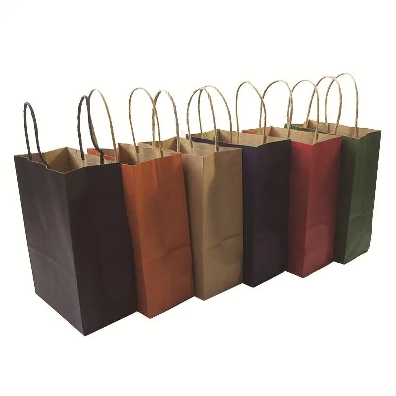 

10PCS Fashionable 21X15X8cm kraft paper gift bag with handle/shopping /Christmas brown packing bag/Excellent quality recycle