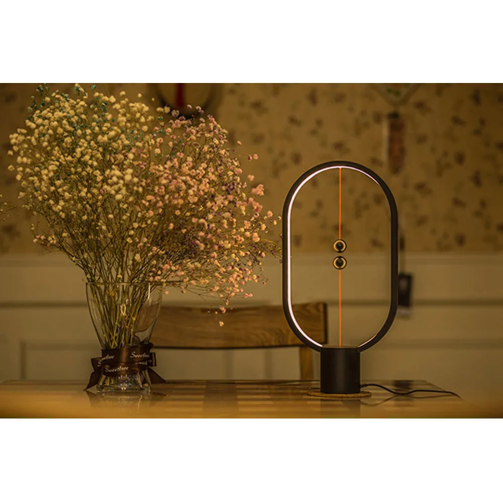 

HZFCEW Heng Balance LED Table Lamp Ellipse Magnetic Mid-air Switch USB Powered Warm White Eye-Care Night Light Decoration