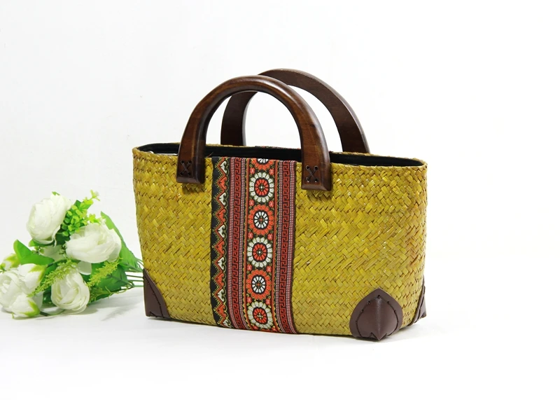 

The new Thai version of the seaweed hand-woven package female national style wooden handle handbag retro travel beach bag