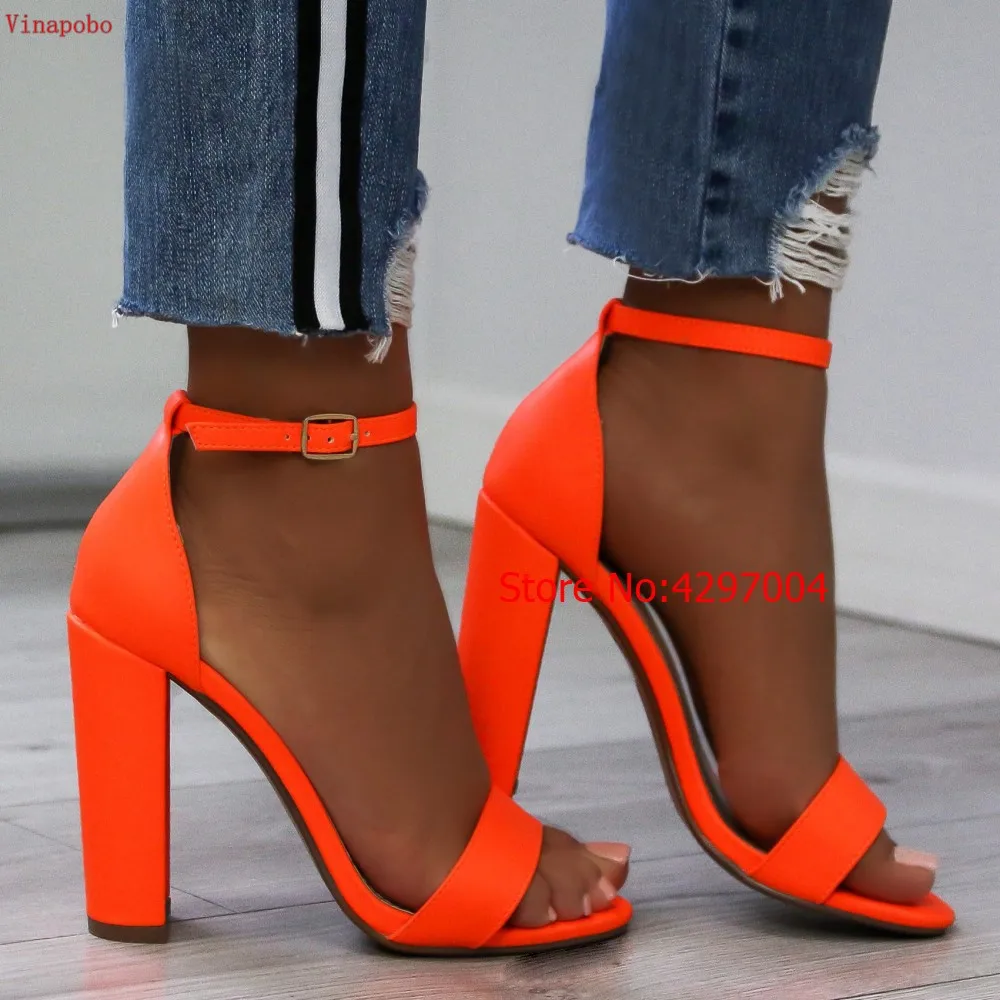 sandaly-na-slupku-neon-orange-ariel