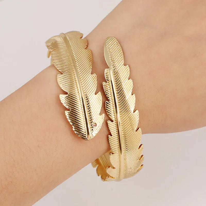 

European and American Bohemian style Retro exaggeration Metal feathers Opening Arm ring bracelet Free shipping