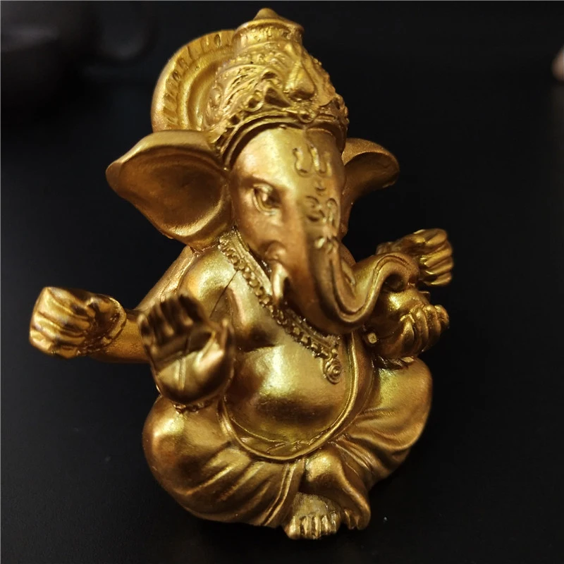 Gold Ganesha Elephant God Statue - Elegant Home and Garden Decor Piece