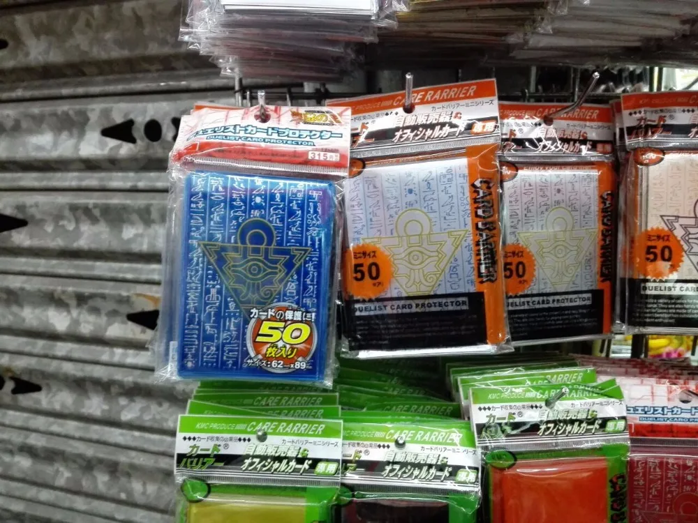 100 упаковок/партия (5000 шт.) Yu Gi Oh! Косплей Yugioh Millennium головоломка Аниме держатель