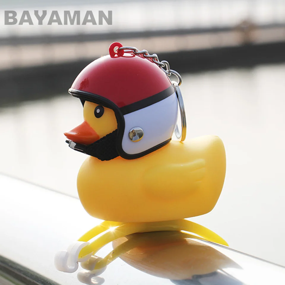 

1pc Small Yellow Duck with helmet Head Lights Bicycle Motorcycle Bells broken wind duck Cartoon Toys for Kids