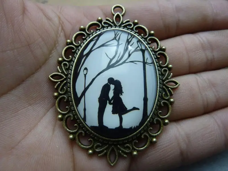 

2pcs 30x40mm Handmade Photo Glass Cabochons (girl and man) GL 1-32