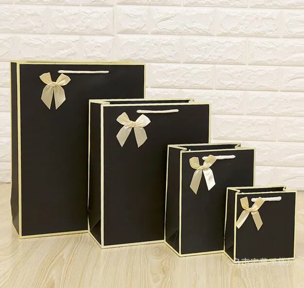 

Free Design 100PCS/LOT Black Paper Gift Bag Packing Bag Print LOGO Free Shipping