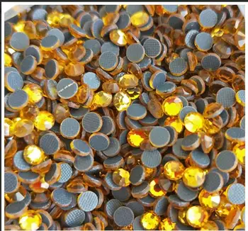 

Free Shipping! 1440pcs/Lot, High Quality ss16 6bags=6*1440pcs Gold Hot fix Rhinestones wholesale price,loose rhinestone