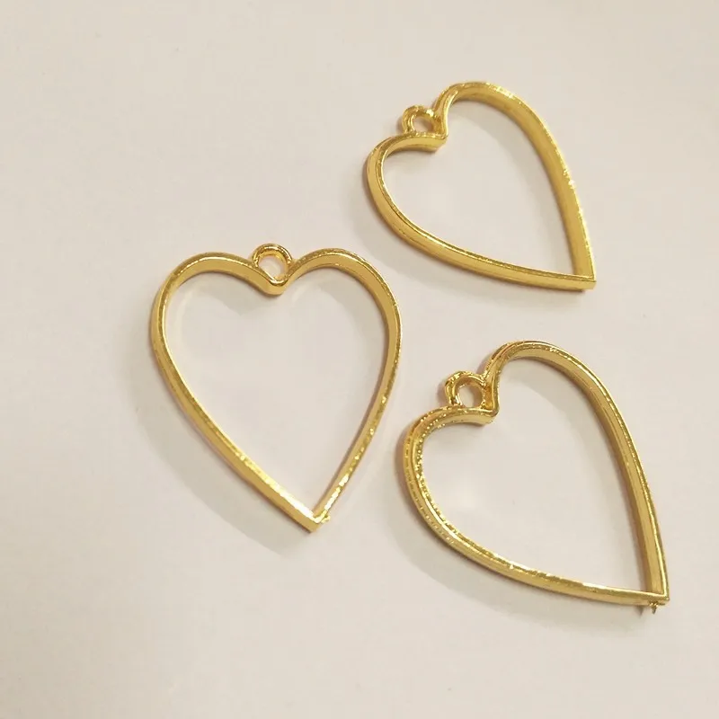 

GLADZGT 10 pcs/lot Love heart shape Metal Frame Pendant Gold Charm Bezel Setting Cabochon Setting UV Resin Charms