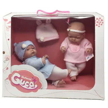

Guca-2's cash box dolls with blue and pink dress