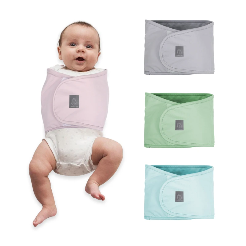 baby holding towel