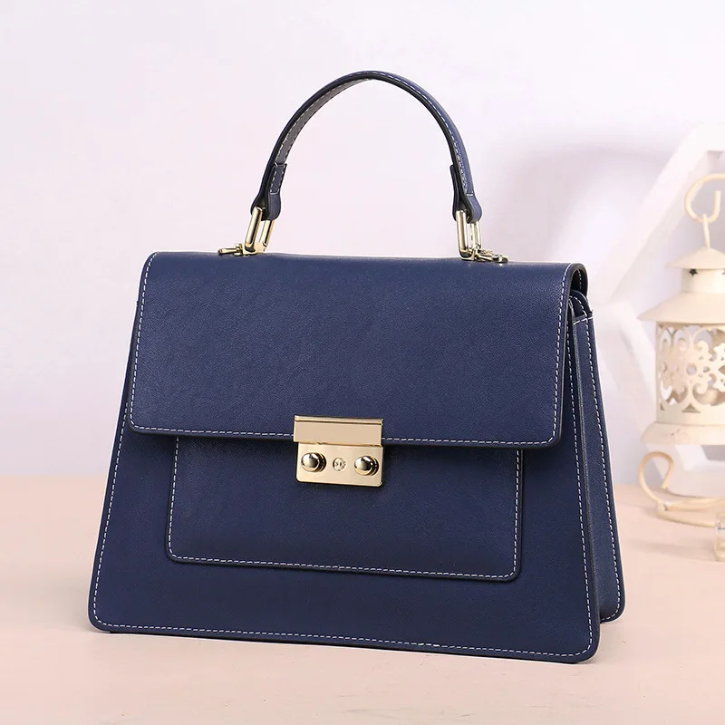 

Gorgeous and trendy luxury handbags women bags designer beautiful metal lock and sewing leather decorated women leather handbags