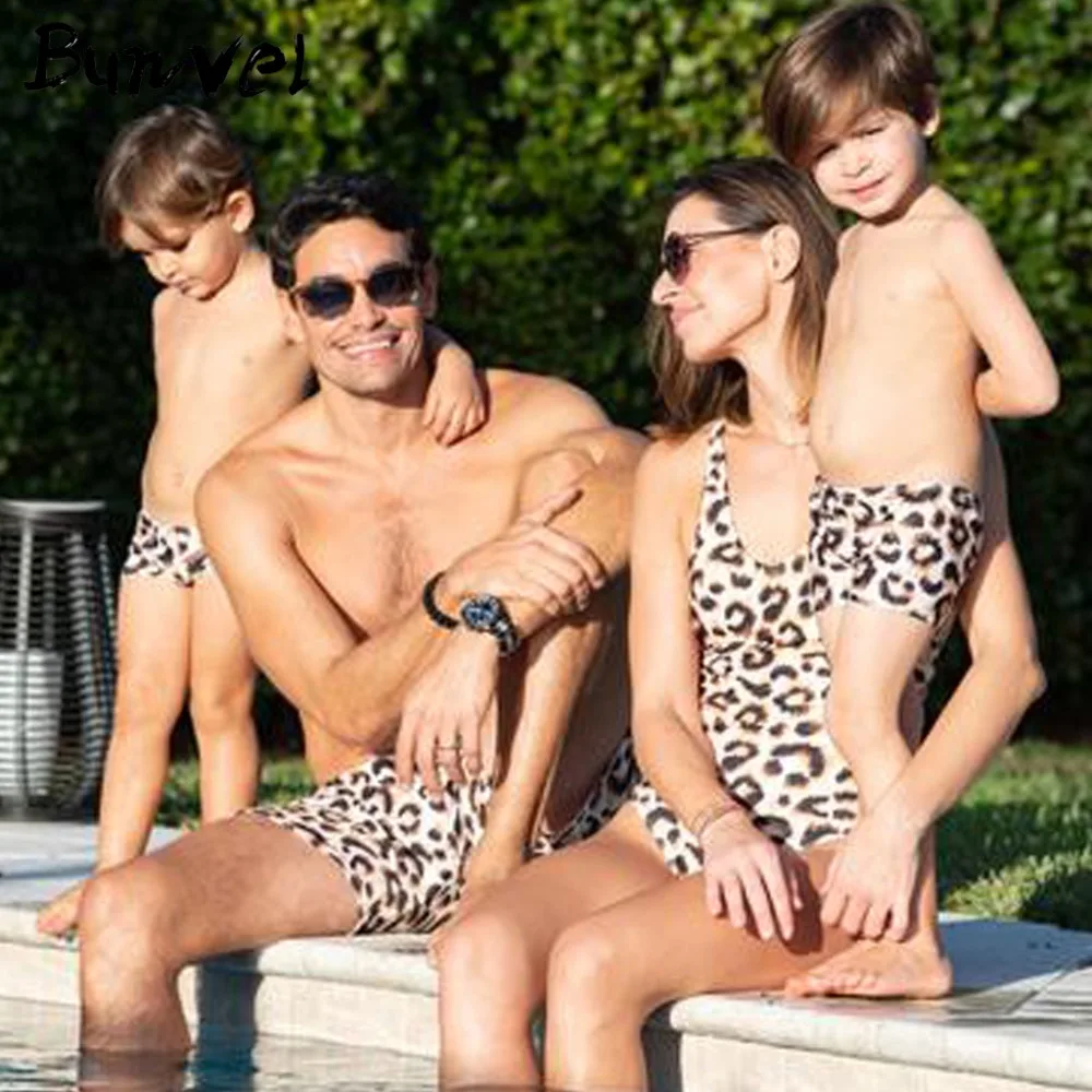 

Family with summer clothes Leopard print swimsuit mom and daughter beachwear Family beach swimwear
