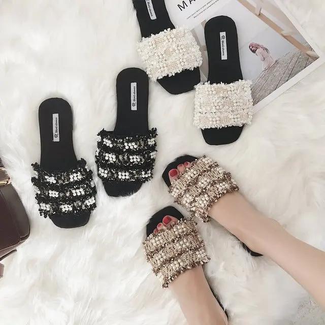 

Korean fashion square head one word drag female 2019 summer new pearl sequins woven wild wear slippers...