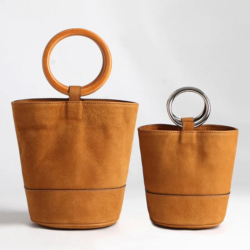 Metalen ring hand emmer voor vrouwen vintage stijl echt leer schoudertassen sac vrouwelijke modeshow carry packet Hout ring tas Metalen ring hand emmer voor vrouwen vintage stijl echt leer schoudertassen sac vrouwelijke modeshow carry packet Hout ring tas
