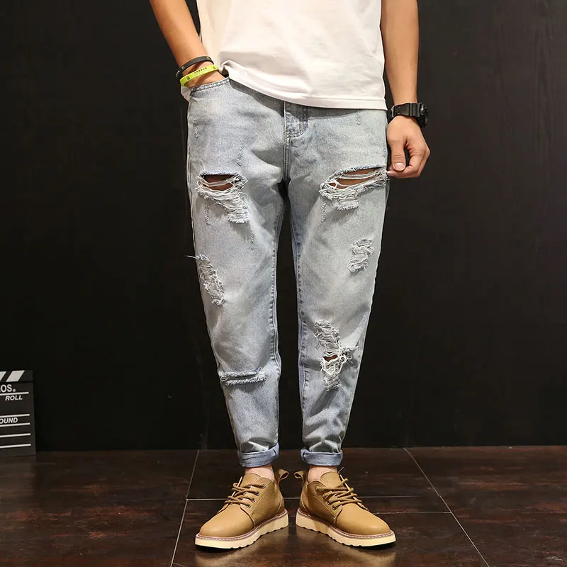 

Spring Haren pants men Japanese ripped jeans pants skinny pants loose Korean young beggar