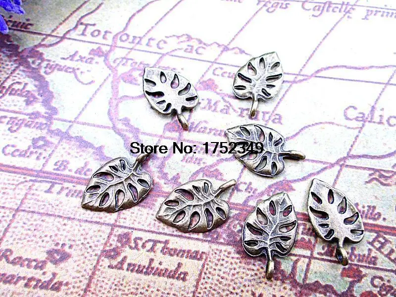 

35pcs--Antique Bronze Lovely hollow Leaf Charm Pendant 20x12mm