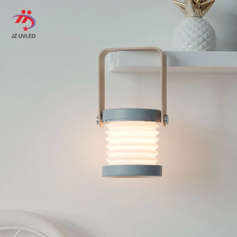 

Novelty creative portable lanterns led night light deformation desktop table lamp usb rechargeable outdoor portable lamp