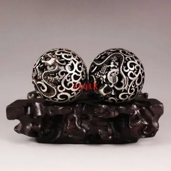 

OLD COLLECTIONS A PAIR CHINESE SILVER CARVING DRAGON BALL.