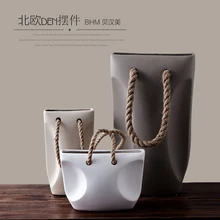 Керамическая креативная лаконичная абстрактная ваза для цветов, горшок для домашнего декора, украшение для комнаты, фарфоровая статуэтка ручной работы, сумочка, ваза