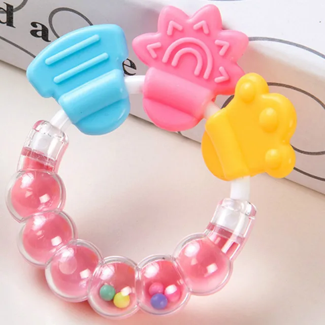 Cartoon Baby Teether Educational tools Chew Teeth Ring Biting Baby Rattle Toy Bed Bell Silicone Handbell Jingle Birthday Gifts Pink