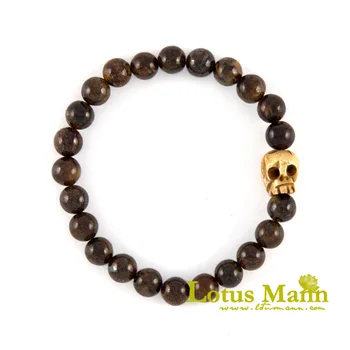 

Lotus uranolite mann asteriated pyroxene suntanned bone bracelet