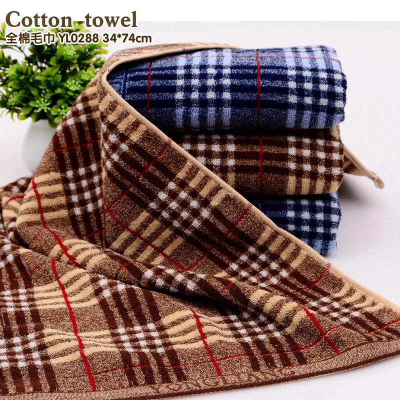 A dark colored towel A stylish Plaid washcloth A fully cotton, lint