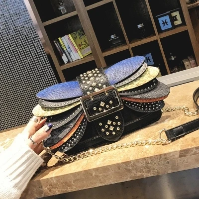 

Small bag female 2018 new wing rivet chain small square package snake mixed color Shoulder Messenger bag tide