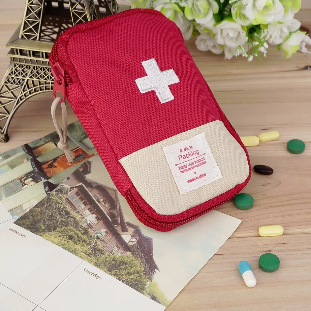 Durable al aire libre Camping hogar supervivencia portátil Kit de primeros auxilios estuche práctico Mango para facilitar el transporte 3 colores opcional