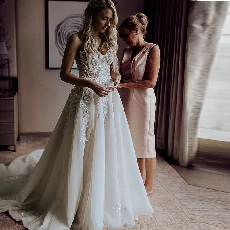 

Long A line Lace Appliques Sweetheart See Through Strapless Wedding Dress Robe De Mariee Sofuge Boho Dubai Arabic Abiti Da Sposa