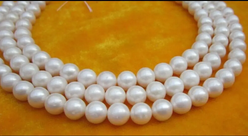 

Hot selling free shipping******AAA+ 9-10MM NATURAL WHITE SOUTH SEA PEARL NECKLACE 50" 14K CLASP