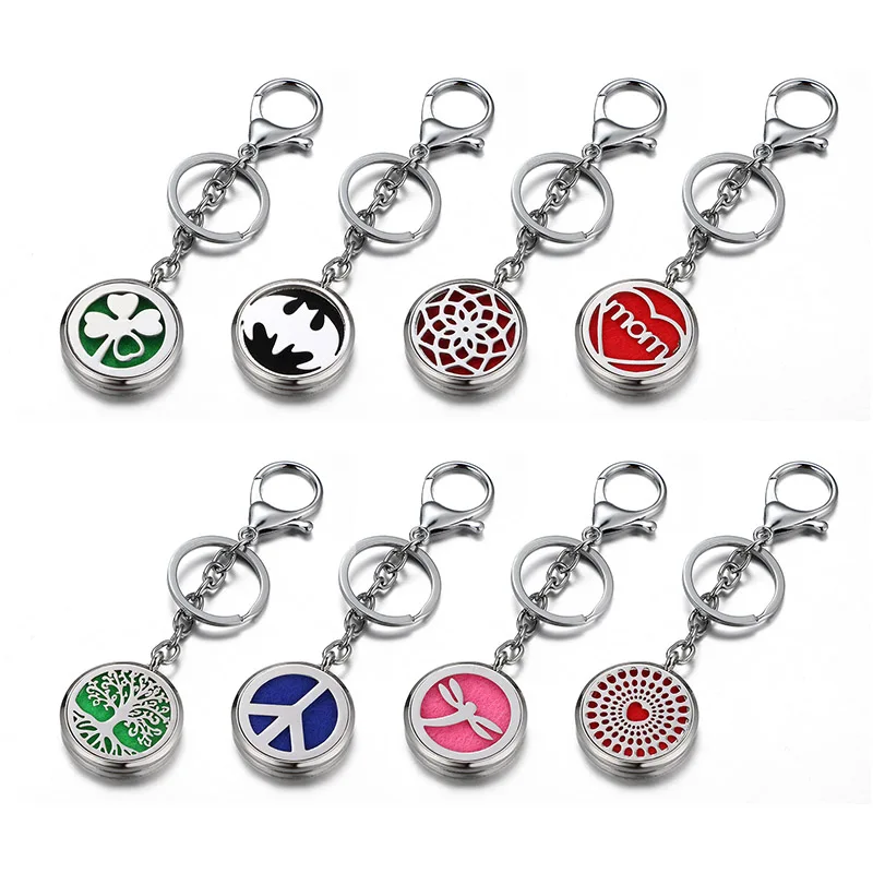 

Fahsion Clover Life Tree Love mom pattern Hollow Aromatherapy Perfume Locket Keychain Hook floating locket key chain wholesale