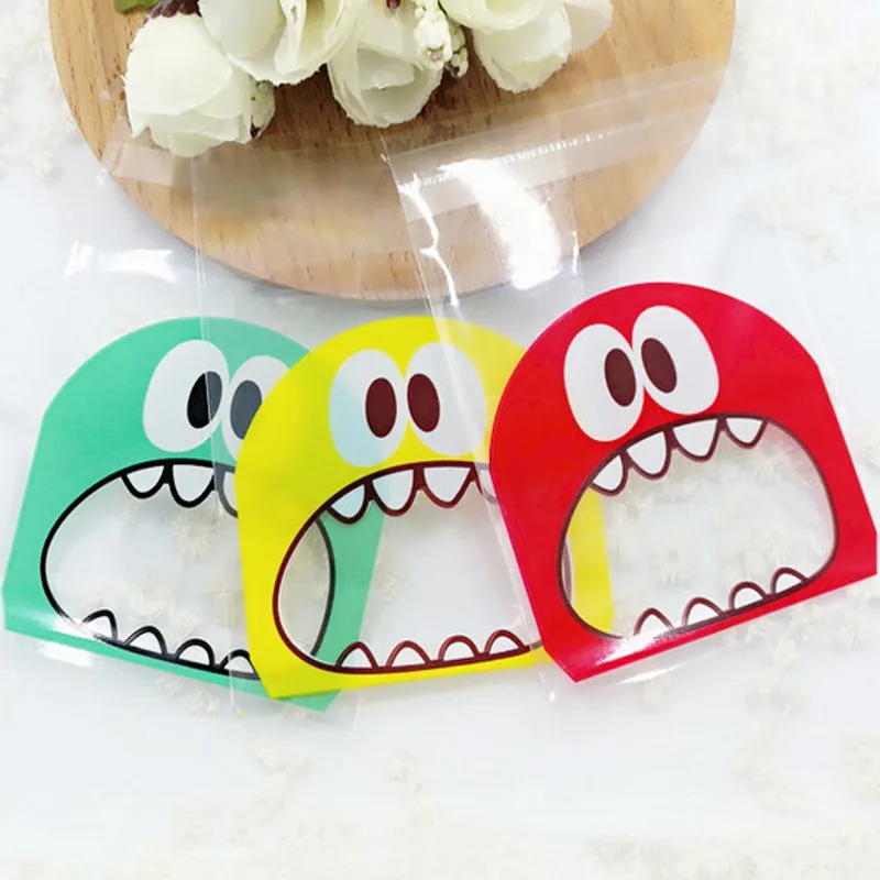 

Sale 50Pcs/Bag 7cm 10cm Cute Cartoon Monster Mouth Cookie Candy Self-Adhesive Plastic Bags Biscuits Baking Package Party Decor