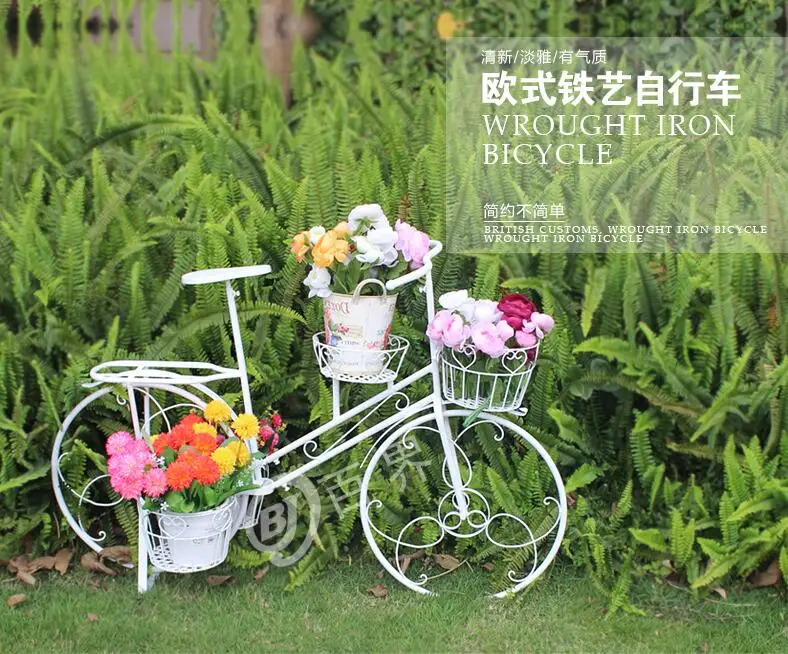 

The window decoration creative shooting props green plant bicycle European multi-layer iron art flower stand.
