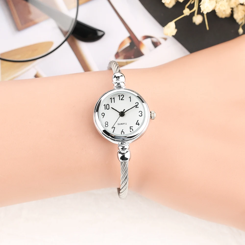 Elegant 2018 New Arrival Women Bangle Watch Roman Number Dial Quartz Wrist Watch Simple Rotating Twist Stainless Steel Band (28)
