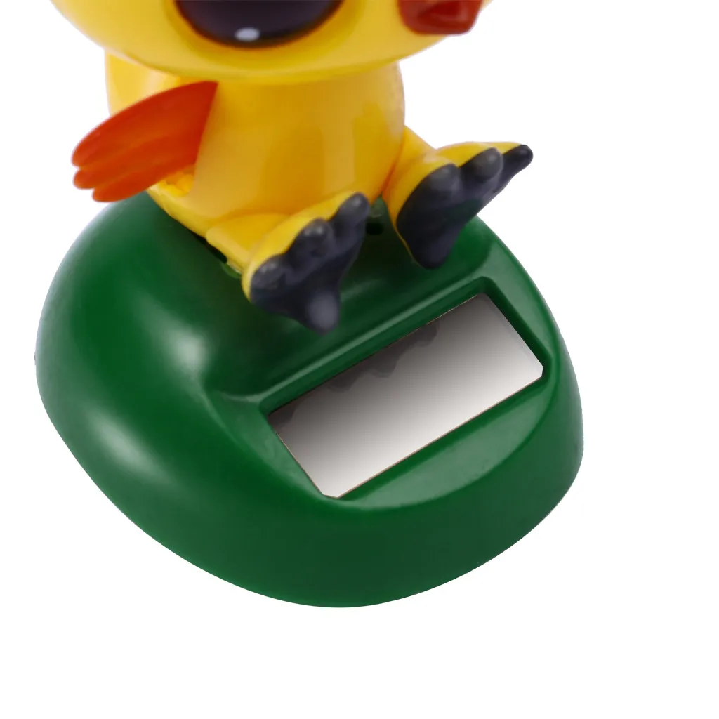 

Adorable Cute New Hot Solar Powered Little Yellow Duck Dancing Animal Animated Bobble Dancer Toy Car Decoration L0516