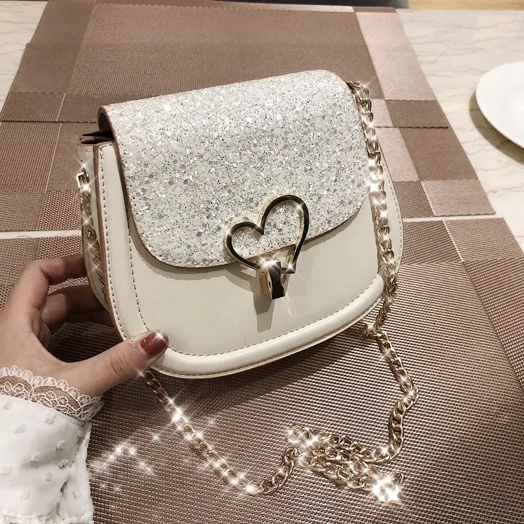 

New Korean version of Pu saddle bag with heart-shaped lock sequins in summer of 2019