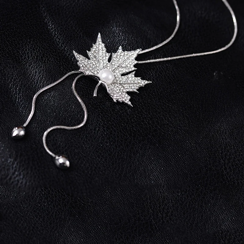 

Women Flower Long Adjustable Chain Pendant Sweater Necklace(Maple Leaf Silver Necklace)