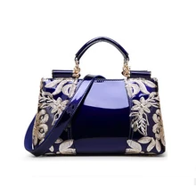 Primavera Nuevo Bolso de Charol Brillante Bolso de Cuero de Vaca de Las Mujeres Embrodiery Flor Bolsas Mamá Bolsa De Bolsas de Hombro de Alta Calidad