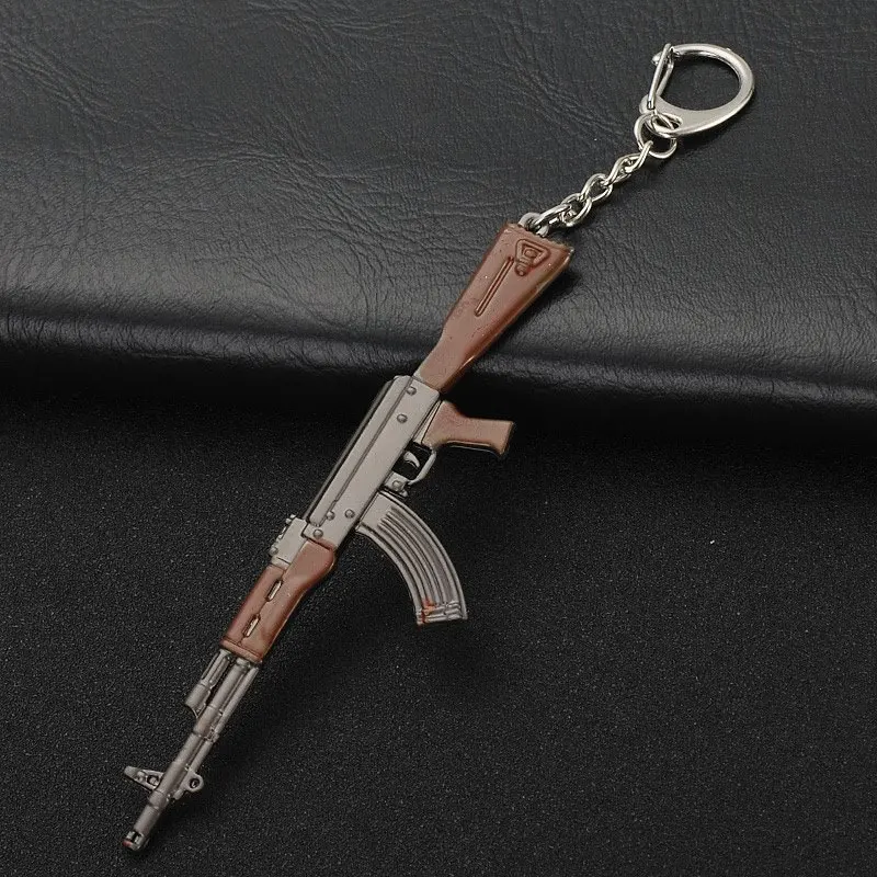 

Fashion Game Keychain AK47 Submachine Gun VSS Sniper Rifle M416 Bullet Pendant Men's Key Chain Best Souvenir Gift Alloy Key Ring